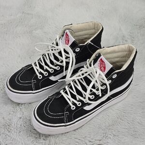 Vans Black and White High-Top Sneakers